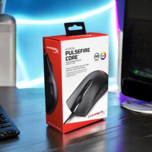 HyperX Pulsefire Core RGB Gaming Mouse retail box on desk setup with RGB background