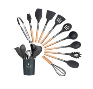 12-piece pink silicone kitchen utensil set featuring wooden handles and a matching storage bucket on a light gray background.