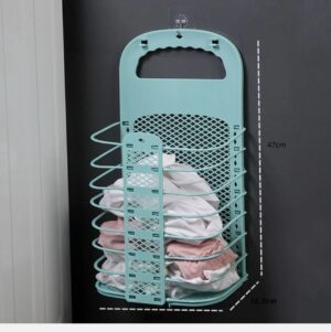 Mint green wall-mounted folding laundry basket with dimensions 47cm by 27cm showing clothes inside.