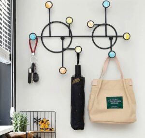 Black geometric metal wall rack with 9 multi-colored circular hooks showing dimensions 42.5cm by 30.5cm.